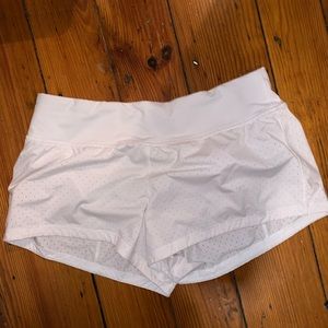 TWO PAIRS OF LULULEMON SHORTS